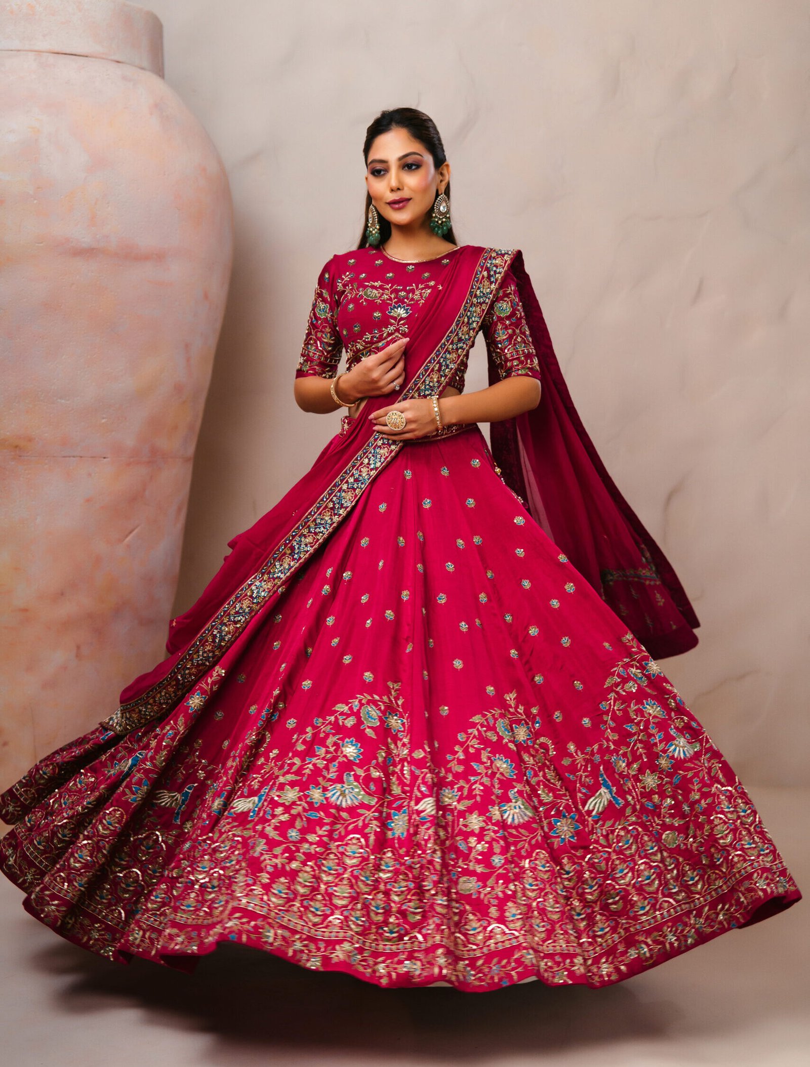 Maroon bridal lehenga choli with multicolor zari and thread embroidery